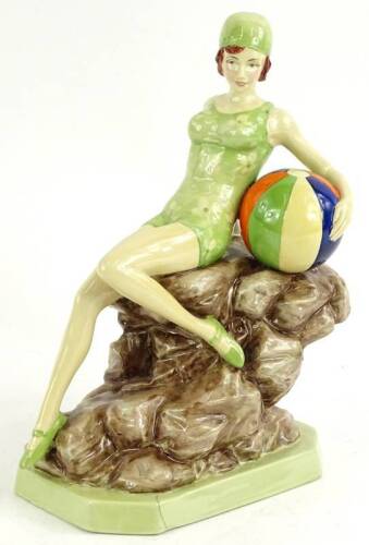 A Peggy Davies ceramic figure, Bathing Belle, modelled by Andy Moss, the title etc., scratched out, 22cm H. (AF)