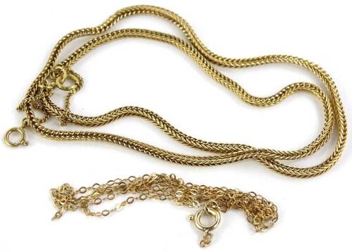 Two 9ct gold chains, to include a 9ct gold fancy link chain, with additional safety chain, 7.8g, and a 9ct gold fine link chain, 1.1g. (2)