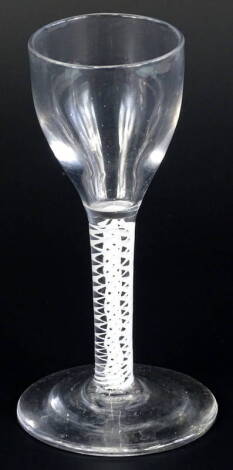 A small wine glass, with bell shaped bowl and opaque twist stem and fold over base, 13cm H.