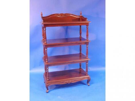 A mahogany four tier whatnot