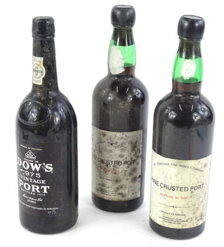 Three bottles of vintage port, to include a Yorkshire Fine Wines company fine port for 1980, 1979 and Dow's vintage port for 1975.