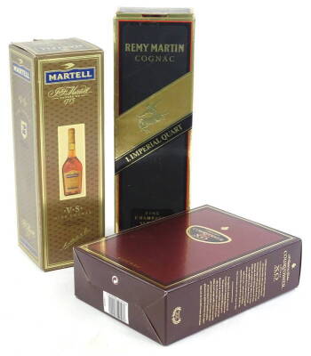 Three bottles of Cognac, to include Martell, Remy Martin and Courvoisier xo Imperial.