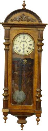 A 19thC walnut cased wall clock in Vienna style, the painted dial labelled Jones and Jones, Porth, 135cm H.