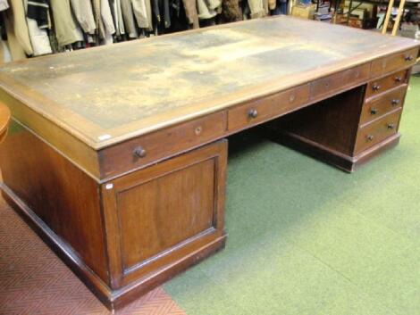 A large Victorian mahogany partners desk with inset leather top