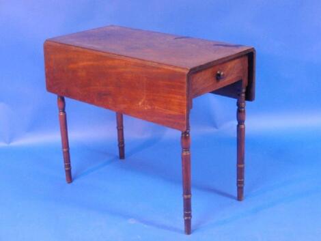 A George III mahogany Pembroke table with frieze drawer and turned legs