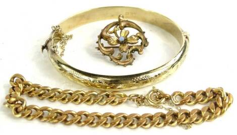 Three items of jewellery, to include a silver floral bar brooch set with central opal, a silver gilt hinged bangle, a brass curb link chain with a 9ct gold clasp. (3)