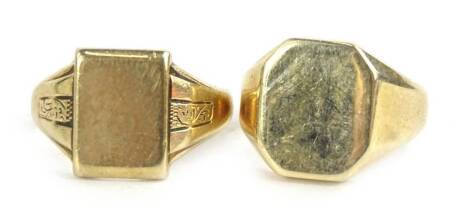 Two 9ct gold signet rings, one of chunky design with octagonal plain shield, the other with rectangular shield, bearing initial C (worn), and etched design shoulders, 20.9g.