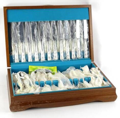 A canteen of Kings pattern silver plated cutlery, the teak fitted case with turquoise velvet lining, 46cm W.