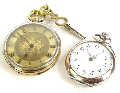 Two fob watches, comprising one fob watch with enamel design decoration of a lady, (AF), with clock key, yellow metal unmarked, and another silver gilt fob watch, marked to interior 800, Remontoir cylindre 10 rubis with white enamel dial, and gold hands (