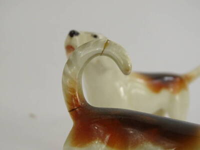 A Beswick ceramic model of a huntsman on a brown horse, and four hounds. (AF) - 3