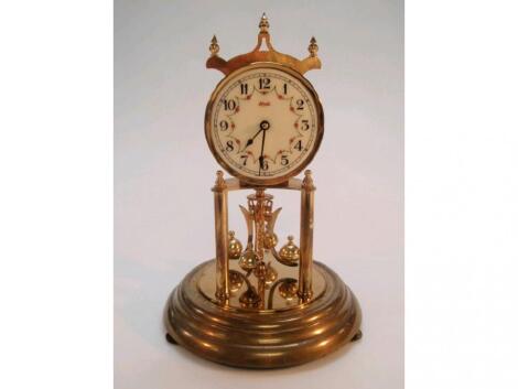 A Kundo perpetual movement mantel clock