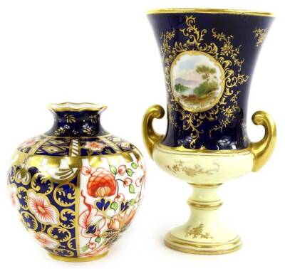 A Coalport two handled vase, decorated in miniature with a river landscape, on a blue ground, printed marks to underside, 12cm H, and a Royal Crown Derby small Imari vase, 8cm H. (2)