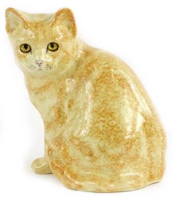 A Winstanley ceramic model of a ginger cat, scripted mark to underside and number 4, 22cm H.