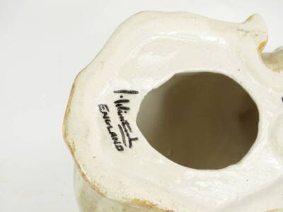 A Winstanley ceramic model of a crouching ginger tom cat, scripted mark to underside, number 5, 33.5cm W. - 2