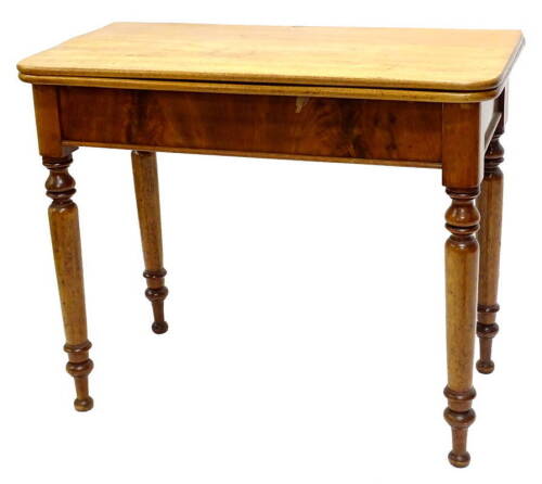 An early Victorian mahogany tea table, the rectangular top with rounded corners to the front, on turned tapering legs, 92cm W.