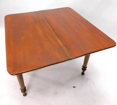 An early Victorian mahogany tea table, the rectangular top with rounded corners to the front, on turned tapering legs, 92cm W. - 4