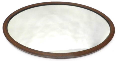 An Edwardian mahogany and cross banded wall mirror, 92cm W.