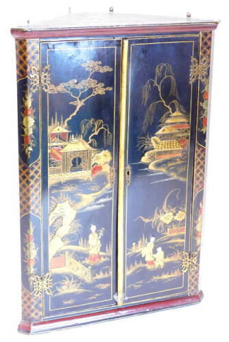 A Japanese corner cabinet, decorated with figures etc., on a black ground, 63cm W.