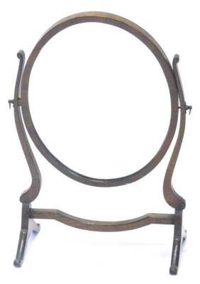 A mahogany swing frame dressing table mirror, with an oval plate on shaped supports, 41cm W.