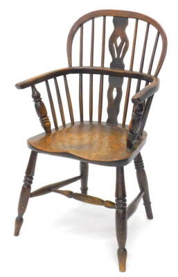 A 19thC ash and elm Windsor chair, with a pierced splat, solid seat on turned legs with H stretcher. (AF)