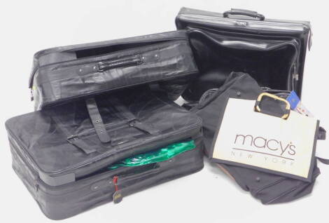 A quantity of black leather luggage, suit bag, cases etc.