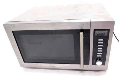 A Kenwood silver microwave oven.