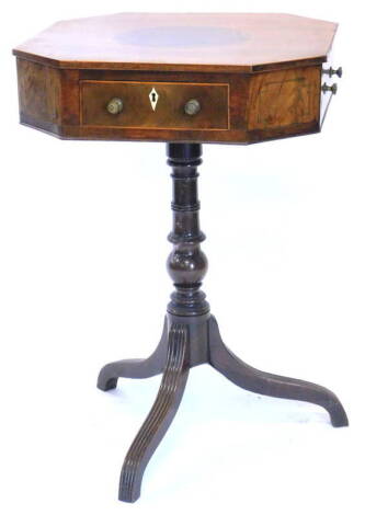 A 19thC mahogany occasional table, the square top with a central circular inlay, canted corners and four drawers on a turned column, and reeded tripod base, 76cm H, 52cm W.