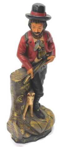 A carved wooden tobacco type figure of an American huntsman, with a dog etc., 77cm H.