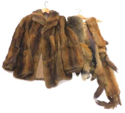 A mink jacket, and fox fur stole.