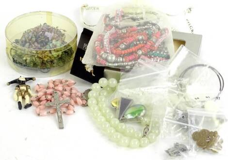 A quantity of costume jewellery and effects, to include modern beaded necklaces, cross pendants, filigree style clip on earrings, Guiding pin badge, boxed necklace, imitation jade necklace etc.