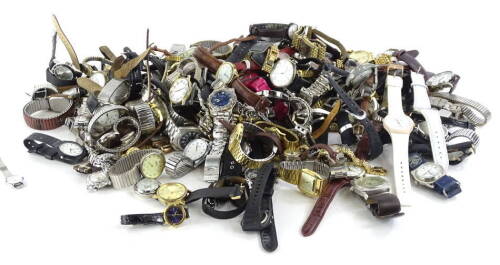 A large quantity of fashion watches, to include Accurist, Casio, Sekonda etc. (2 trays)