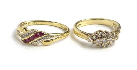 Two 9ct gold dress rings, to include a cz cluster ring, and a garnet and diamond set three row dress ring, 4.7g. (2)