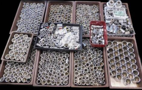 A large quantity of tools, mainly sockets and socket attachments.