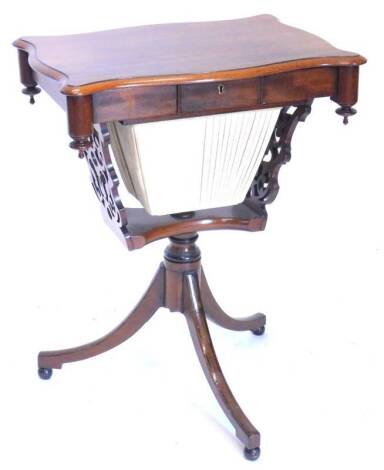 A 19thC continental mahogany work table, with three frieze drawers and a wool drawer, on pierced supports and ebony strung tripod base with bun feet.