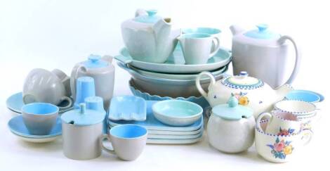 A quantity of Poole pottery, to include two tone tea ware, a cabaret tea set, florally decorated pieces etc.