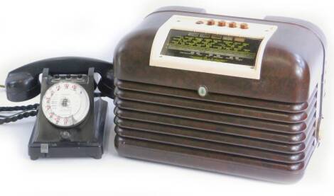 An Ericsson Bakelite telephone, and a Bush Bakelite radio.