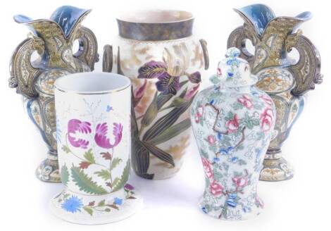 Miscellaneous ceramics, to include a pair of Austrian two handled vases in a manner of Zsolnay, a ceramic oil lamp base, transfer printed vase and cover and a two handled vase decorated with irises.