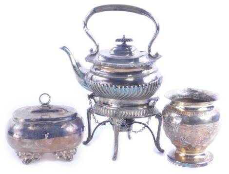 A quantity of silver plate, to include a tea caddy with engine turned decoration, ring handle and a key, a spirit kettle and stand, and a vase with embossed style decoration.