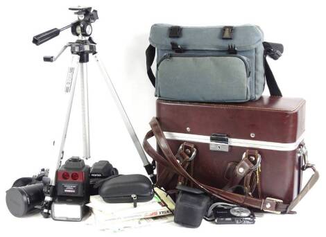 A quantity of cameras and camera equipment, to include Pentax digital, Canon digital, Sat Nav etc.