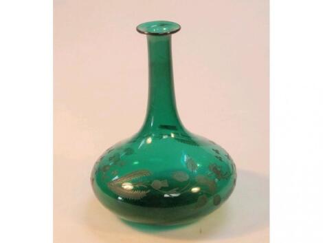 A Victorian wheel cut green glass decanter