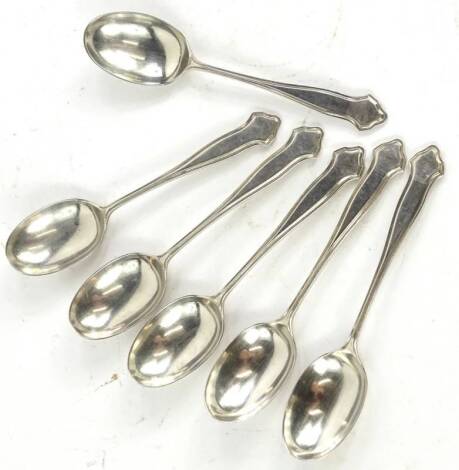 A set of six George V silver teaspoons, each with a tapering handle and a moulded edge, Sheffield 1925, 3oz.