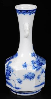 A Japanese Hirado porcelain bottle vase, of octagonal form with stylised mask handles and decorated with peonies and flora in underglaze blue, 19cm H. - 2