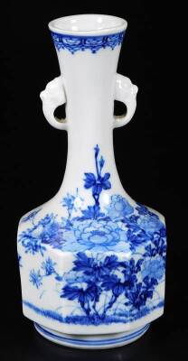 A Japanese Hirado porcelain bottle vase, of octagonal form with stylised mask handles and decorated with peonies and flora in underglaze blue, 19cm H. - 3