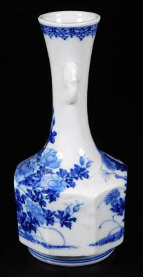 A Japanese Hirado porcelain bottle vase, of octagonal form with stylised mask handles and decorated with peonies and flora in underglaze blue, 19cm H. - 4