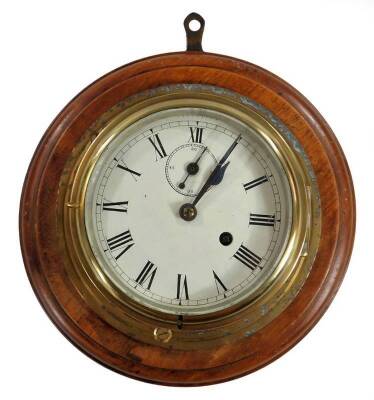 A principally 19thC brass bulkhead fusee ship's clock, with 14cm Dia. Roman numeric dial, with subsidiary Arabic second hand and keywind movement, in a plain circular case, on a mahogany backing, 28cm Dia.