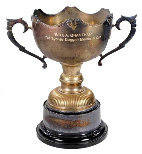 A 20thC silver plated Grantham related trophy, the BRSA Sidney Duggan Memorial cup, the montieth shaped body flanked by angular handles, on a part gadrooned stem and circular base, partially engraved with previous winners, 40cm H.