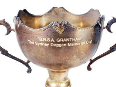 A 20thC silver plated Grantham related trophy, the BRSA Sidney Duggan Memorial cup, the montieth shaped body flanked by angular handles, on a part gadrooned stem and circular base, partially engraved with previous winners, 40cm H. - 2