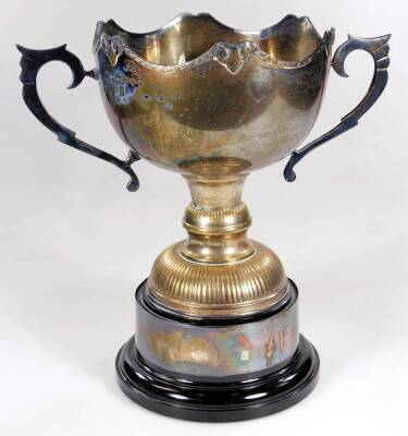 A 20thC silver plated Grantham related trophy, the BRSA Sidney Duggan Memorial cup, the montieth shaped body flanked by angular handles, on a part gadrooned stem and circular base, partially engraved with previous winners, 40cm H. - 3