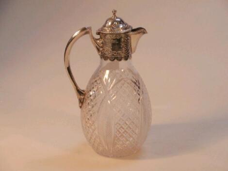 An Edward VII silver mounted cut glass claret jug by William Hutton & Sons