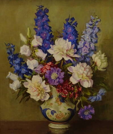 Nesto Warren (20thC). Floral still life, oil on canvas, signed, 60cm x 30cm.